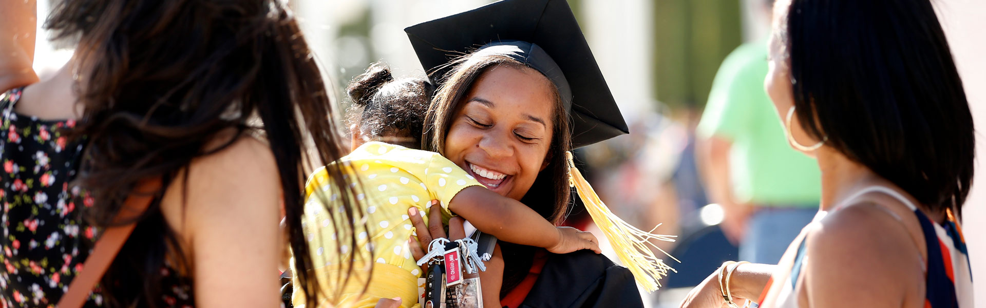 Grad with a child